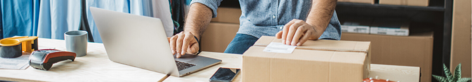 Small business person shipping a box.